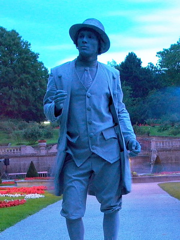 stillman living statue standing in a palace garden